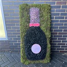 Laurent Perrier Rose Champagne Bottle Flower tribute 