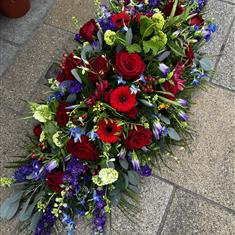 Red Roses Blue and Purple Coffin Spray